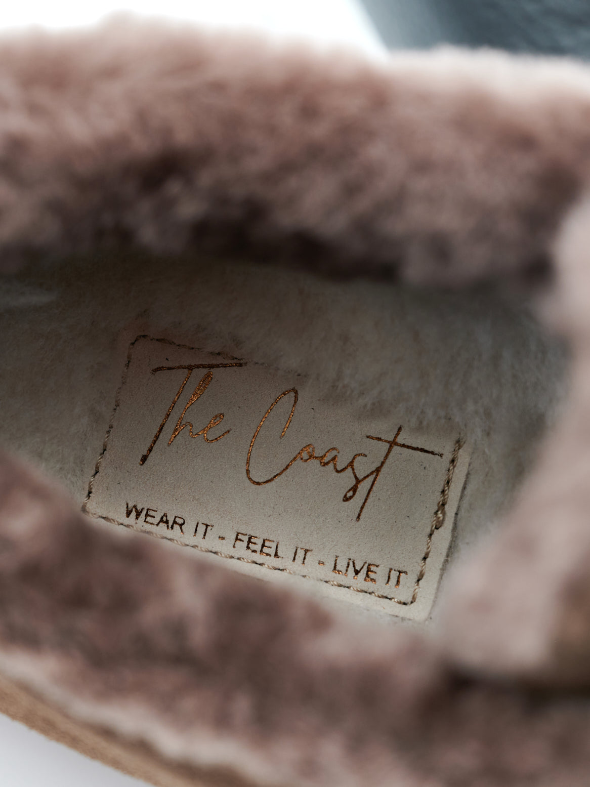 Detailaufnahme: Camoscio Leder und Lammfellfutter