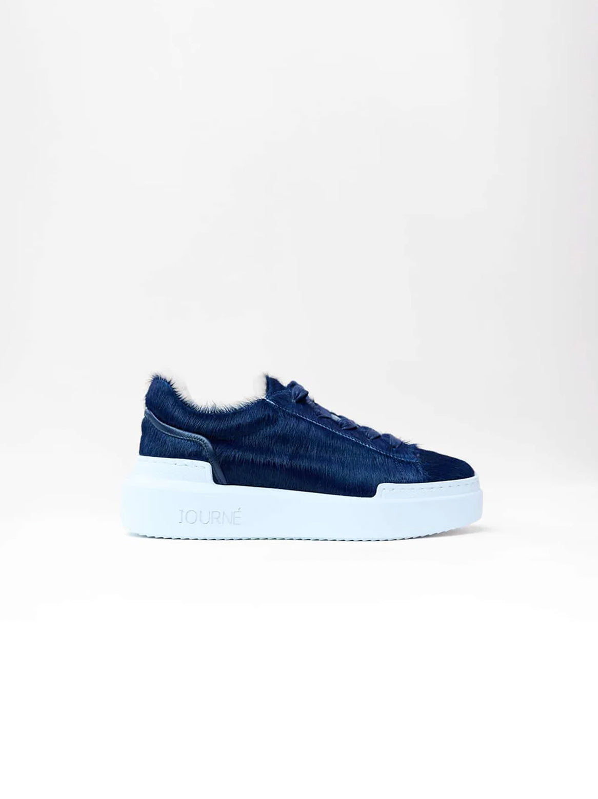 Emilie Sneaker Dunkelblau – Seitenansicht mit weißer Sohle