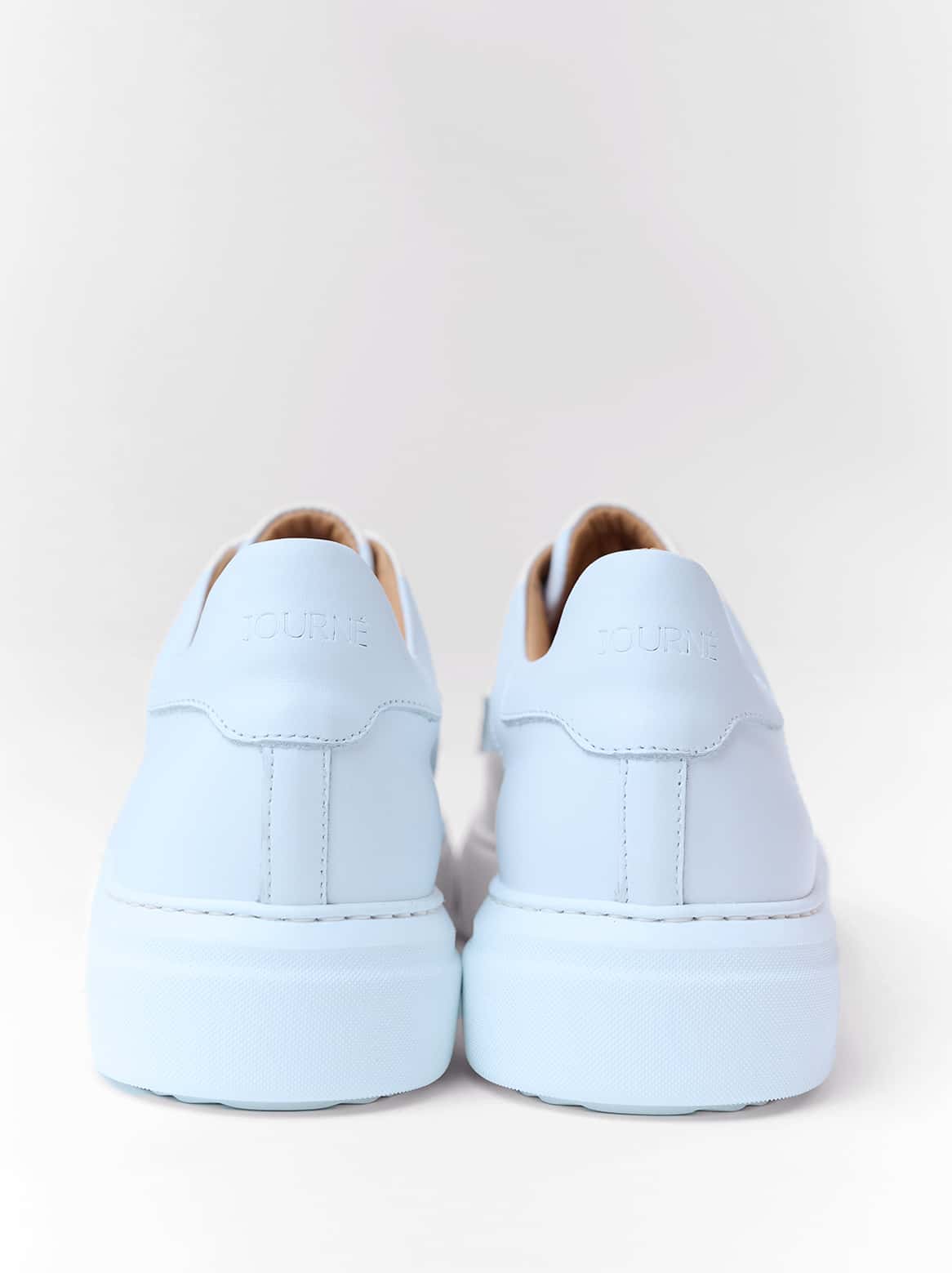 Adelina Sneaker Rückansicht – beide Fersen mit Logo-Prägung