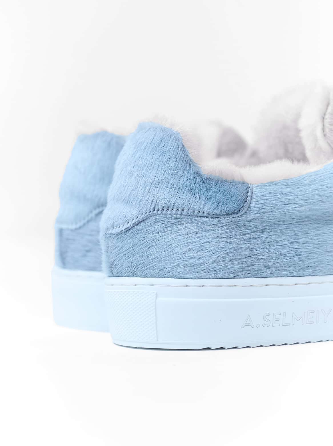 Francesco Sneaker Grau – Detail des Lammfellfutters und Labels